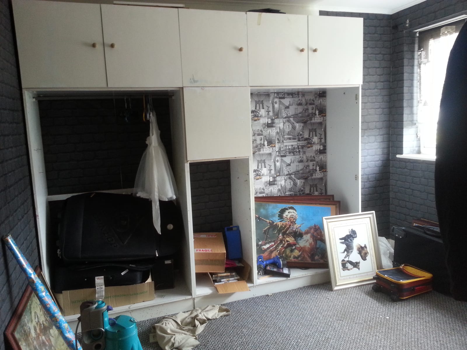 And then all the walls of this cupboard were covered in this strange tin foil stuff...